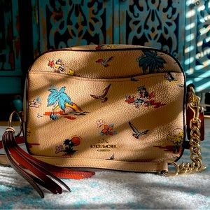 Coach beige crossbody with birds and palm trees